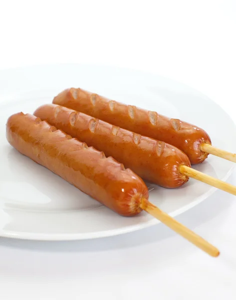 Three Sausages hot dogs — Stock Photo, Image