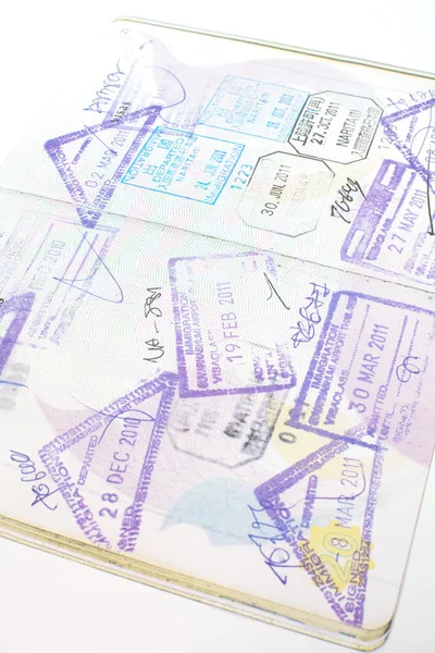 Immigration arrival stamps on passport — Stock Photo, Image