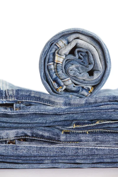 Lot of different blue jeans — Stock Photo, Image