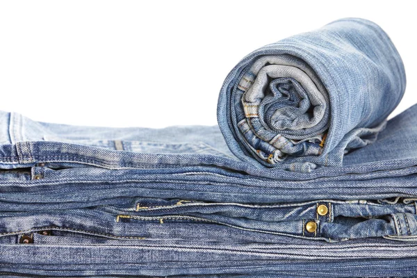 Lot of different blue jeans — Stock Photo, Image