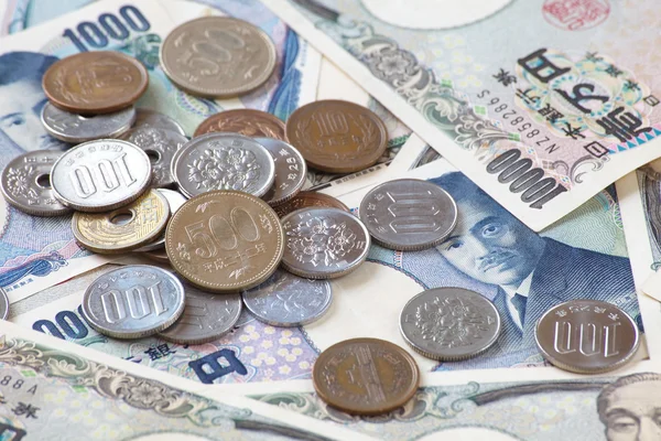 Japanese yen notes and coins — Stock Photo, Image