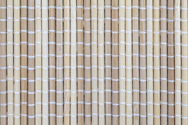 Бамбуковий коричневий солом'яний килимок — стокове фото