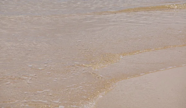 Acqua di spiaggia di sabbia — Foto Stock