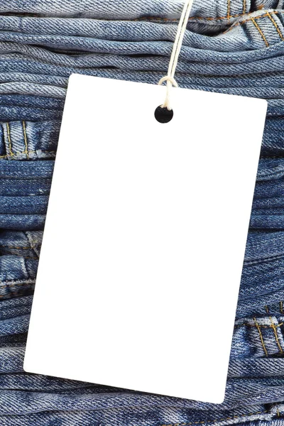 Jeans azuis com etiqueta em branco — Fotografia de Stock