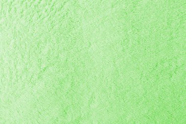 Yumuşak ve temiz pastel yeşil havlu dokusu ve pürüzsüz arkaplan