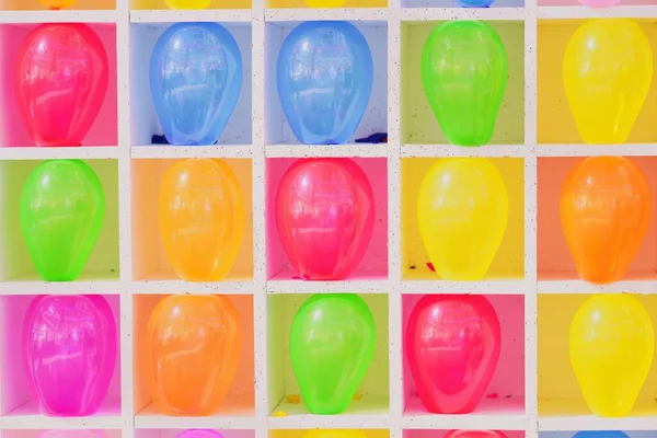 Close-up Wall of Colorful balloons, Popped balloon,  Carnival Balloons Darts Game