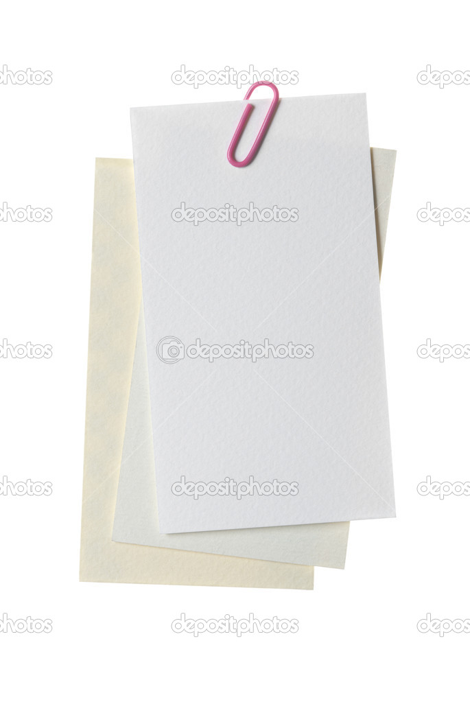 Paper notes with clip isolated on white
