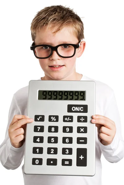 Menino com óculos grandes segurando calculadora muito grande . — Fotografia de Stock