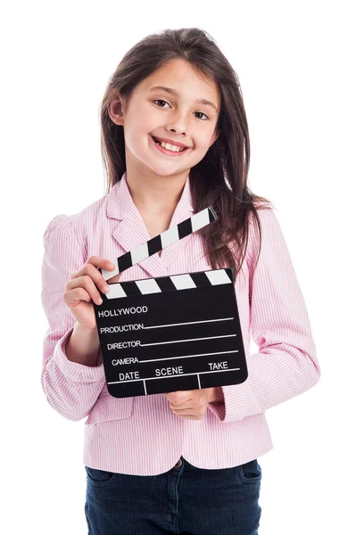 Lachende jong meisje met Filmklapper. — Stockfoto