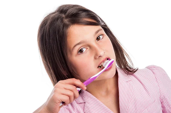 Young Girl Brushing Teeth. Royalty Free Stock Images