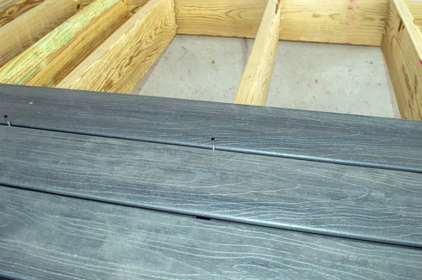Composite Decking Board Being Installed Wooden Deck Frame Easy Maintenance — Stok fotoğraf