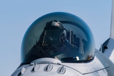 Konya, TURKEY - 07.01.2021: ANATOLIAN EAGLE 2021 Antrenmanında; Türk savaş pilotu taksi tutarken selam veriyor