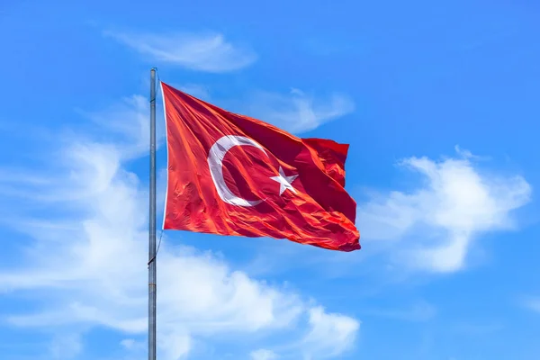 The Turkish flag is the national and official flag of the Republic of Turkey. It consists of a white crescent moon and star on a red background. It was accepted in the Republic period.