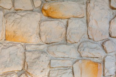 Taş duvarın dokusu. Eski binanın taş duvarının arka plan dokusu. Arkaplan ya da doku olarak taş duvar