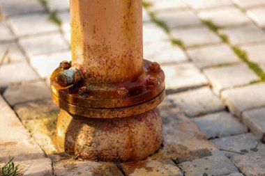 Rusted painted metal, water and corrosion