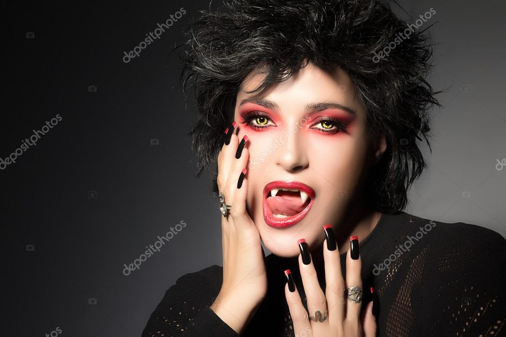 Fashionable Vampire Girl. Fantasy Makeup Stock Photo by ©casther 34083823