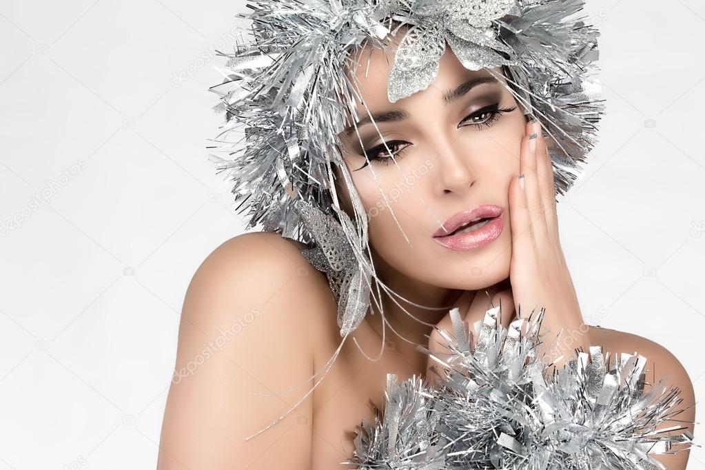 Beautiful Christmas Girl with Silver Hair. Winter Woman Makeup and hairstyle