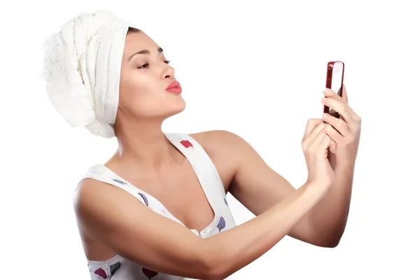 Beautiful Young woman after shower makes selfie sending a kiss — Stock Photo, Image