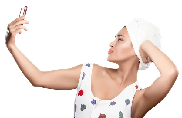 Beautiful Young woman after shower makes selfie sending a kiss — Stock Photo, Image