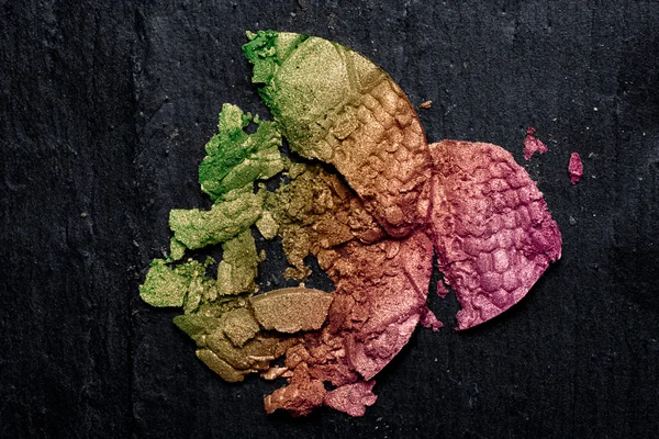 Colorful Crushed Eye Shadow on Blackboard — Stock Photo, Image