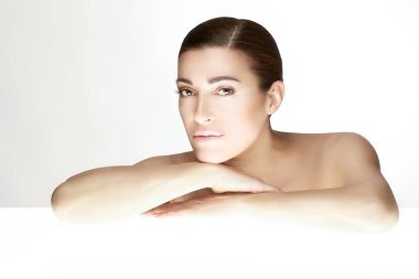 Beauty Skincare and Spa Concept. Beautiful natural young woman with nude makeup on a flawless skin