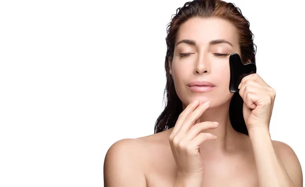 Serene Woman Using Gua Sha Tool Side Face Beautiful Female — Foto de Stock