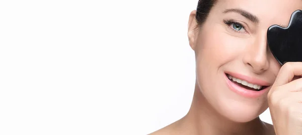 Closeup Smiling Woman Face Luminous Healthy Skin Displaying Massage Gua — 스톡 사진