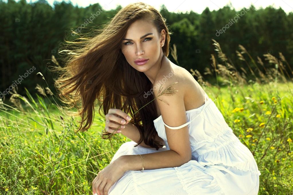 Woman resting on meadow