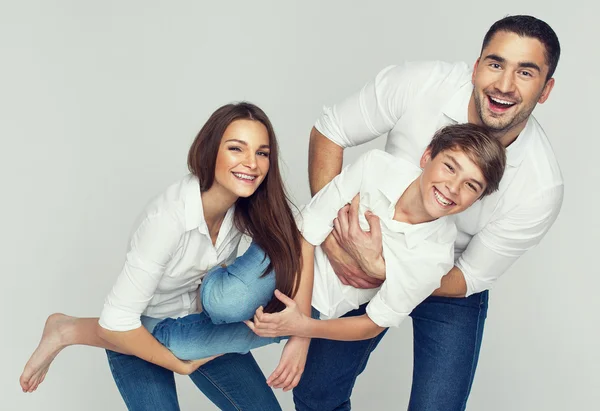 Portrait of happy young family — Stock Photo, Image