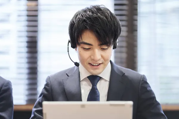 Asian Business Person Responding Customer Center — Stock Photo, Image