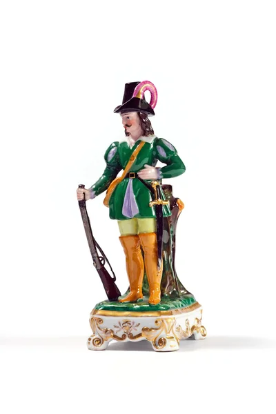 Antique Porcelain statuette hunter — Stock Photo, Image