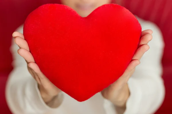 Symbol of heart in hands - big love and Valentines Day — Stock Photo, Image