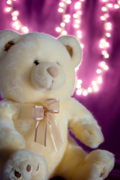 Soft teddy bear with bokeh lights — Stock Photo, Image