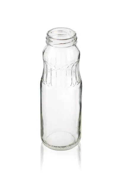 白い背景に隔離された空のグラスジュースボトル — ストック写真