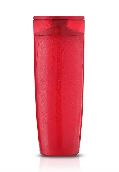 白い背景にヘアシャンプー付きの赤いペットボトル — ストック写真