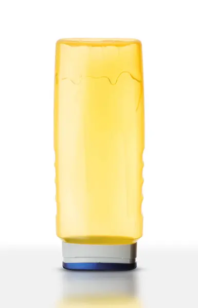 Желтая Пластиковая Бутылка Шампуня Белом Фоне — стоковое фото