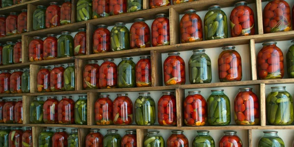 Tinned tomatoes and cucumbers — Stock Image Tinned tomatoes and cucumbers Royalty Free Stock Images