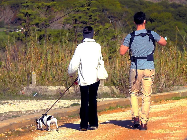 Young Family Puppy Walking Path — Zdjęcie stockowe