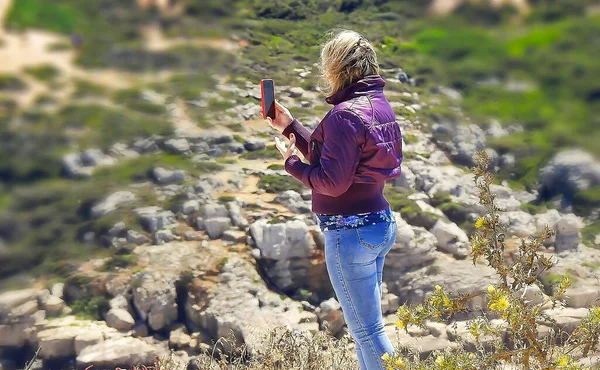 Woman Purple Jacket Taking Pictures Mobile Phone — Stock Photo, Image