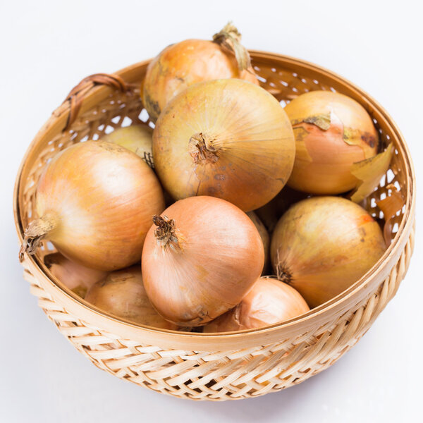 Fresh onion in basket