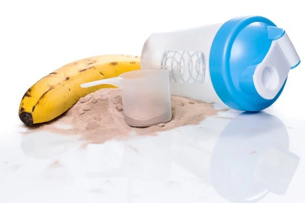 Shaker, Proteinpulver und Banane — Stockfoto