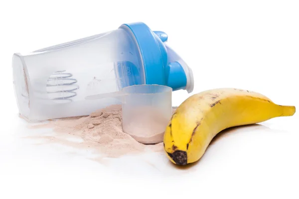 Шейкер, белковый порошок и банан — стоковое фото