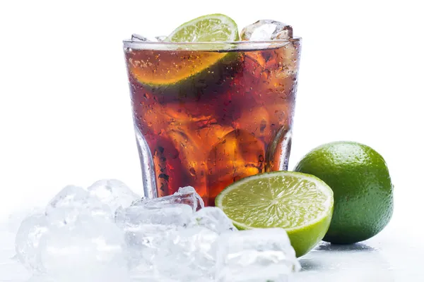 Fresh cocktail with cola drink and lime — Stock Photo, Image