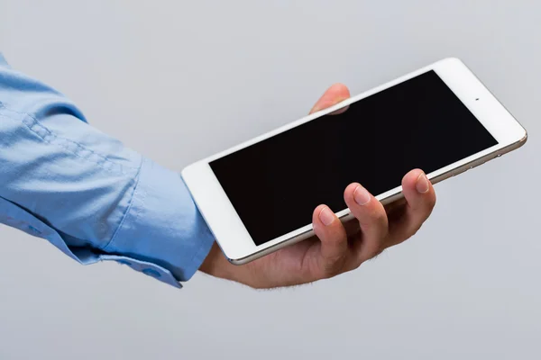 White tablet pc in hands — Stock Photo, Image