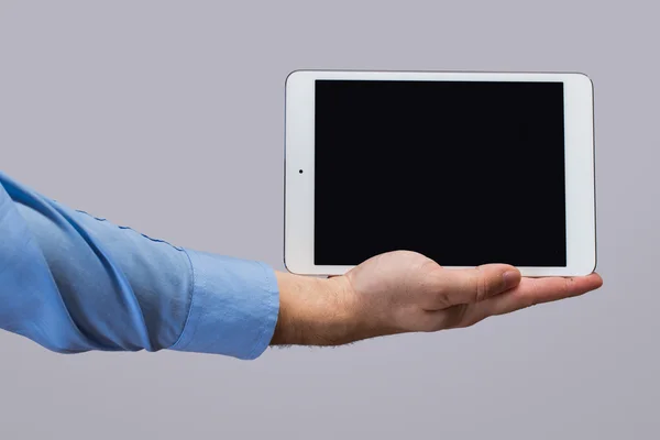 White tablet pc in hands — Stock Photo, Image