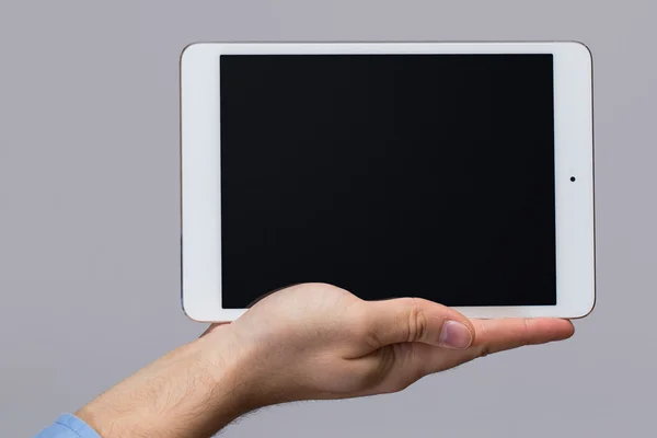 White tablet pc in hands — Stock Photo, Image