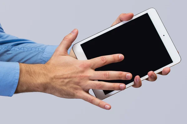 White tablet pc in hands — Stock Photo, Image