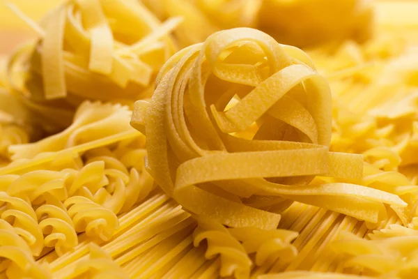 Uncooked macaroni — Stock Photo, Image