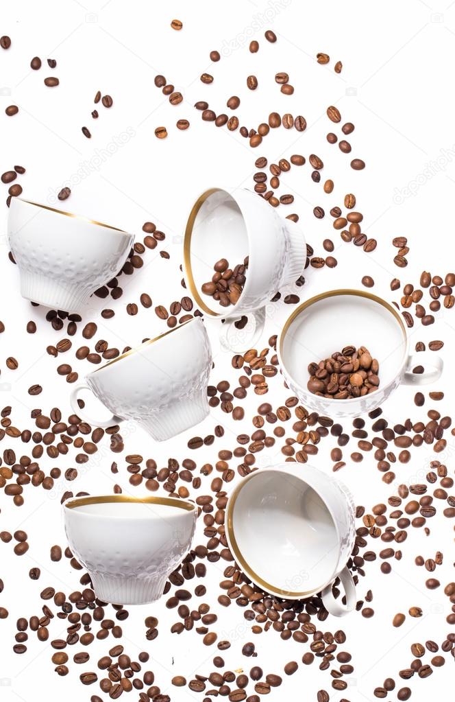 Falling coffee cups and beans