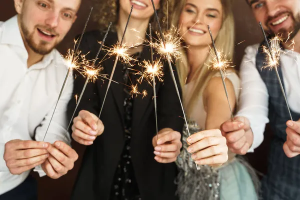 Party People Burning Sparklers Celebrating Holiday Event Camera Focus Sparklers — Stock Photo, Image